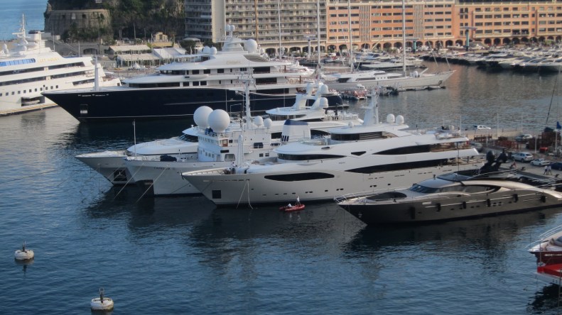 Monte Carlo harbor. to put the sze of these yachts in perspective, look at the guy washing one of the boats (good luck with that).